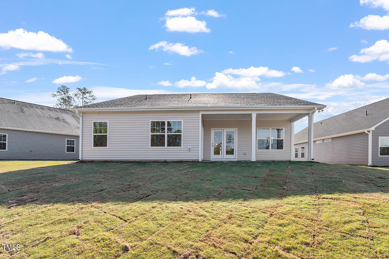 63 Beech Tree Way, Unit 139 Garner, NC 27529 - Photo 2 of 25 a view of a house with a swimming pool