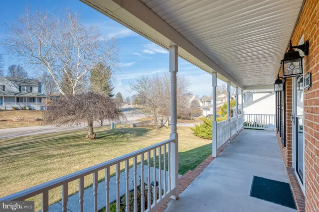 a view of a porch with a yard