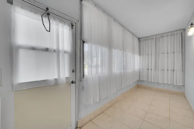 a view of a room with an empty space