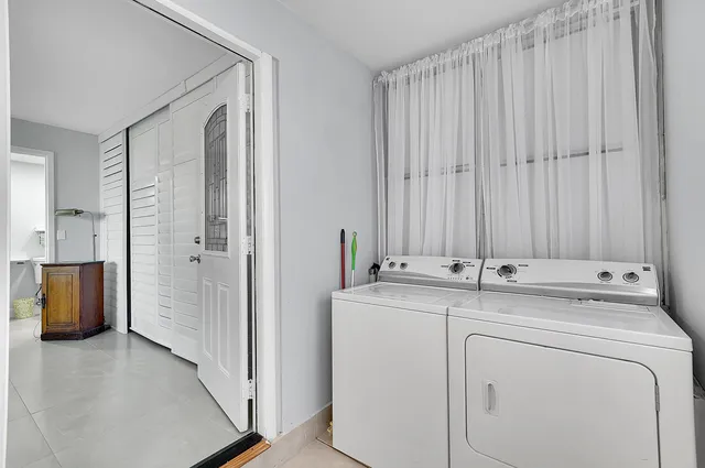 a view of bathroom with dual sinks