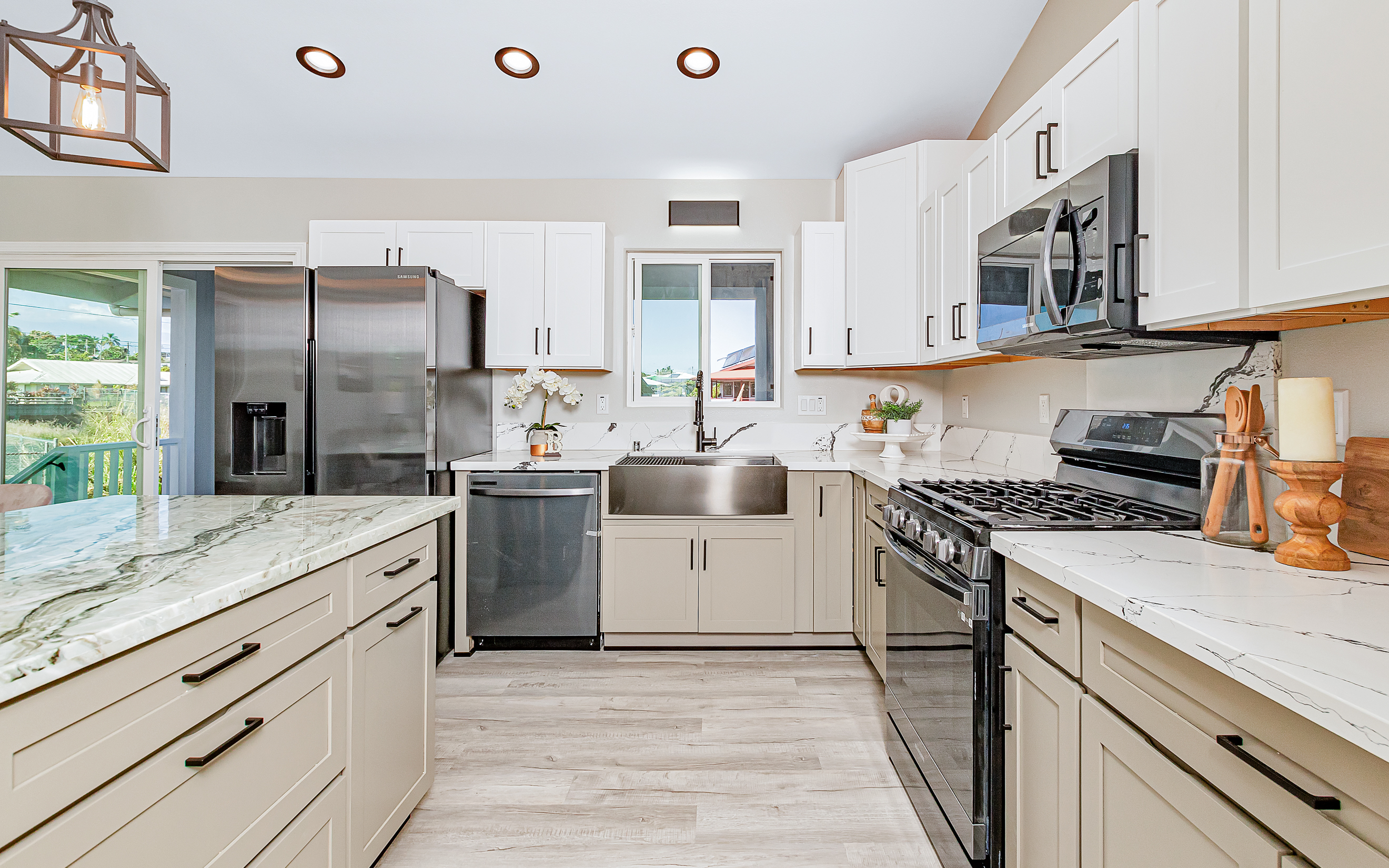 508 Ekela Street Hilo, HI 96720 - Photo 13 of 30 a kitchen with a sink stove and refrigerator