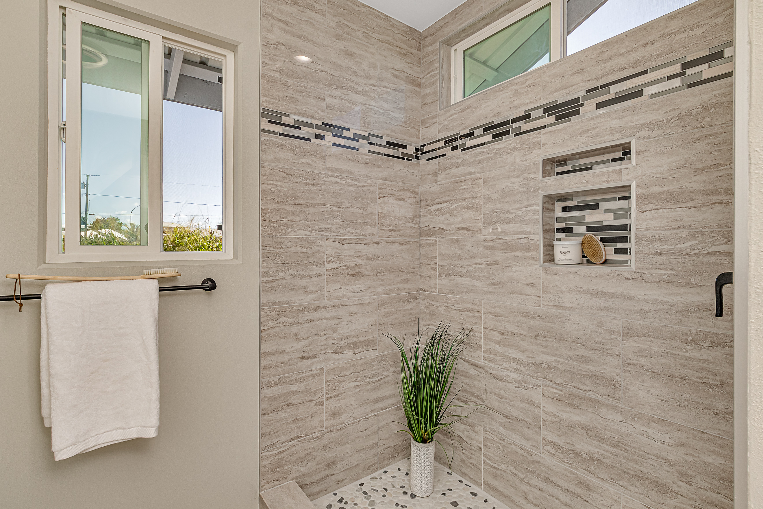 508 Ekela Street Hilo, HI 96720 - Photo 16 of 30 a bathroom with a shower and a window