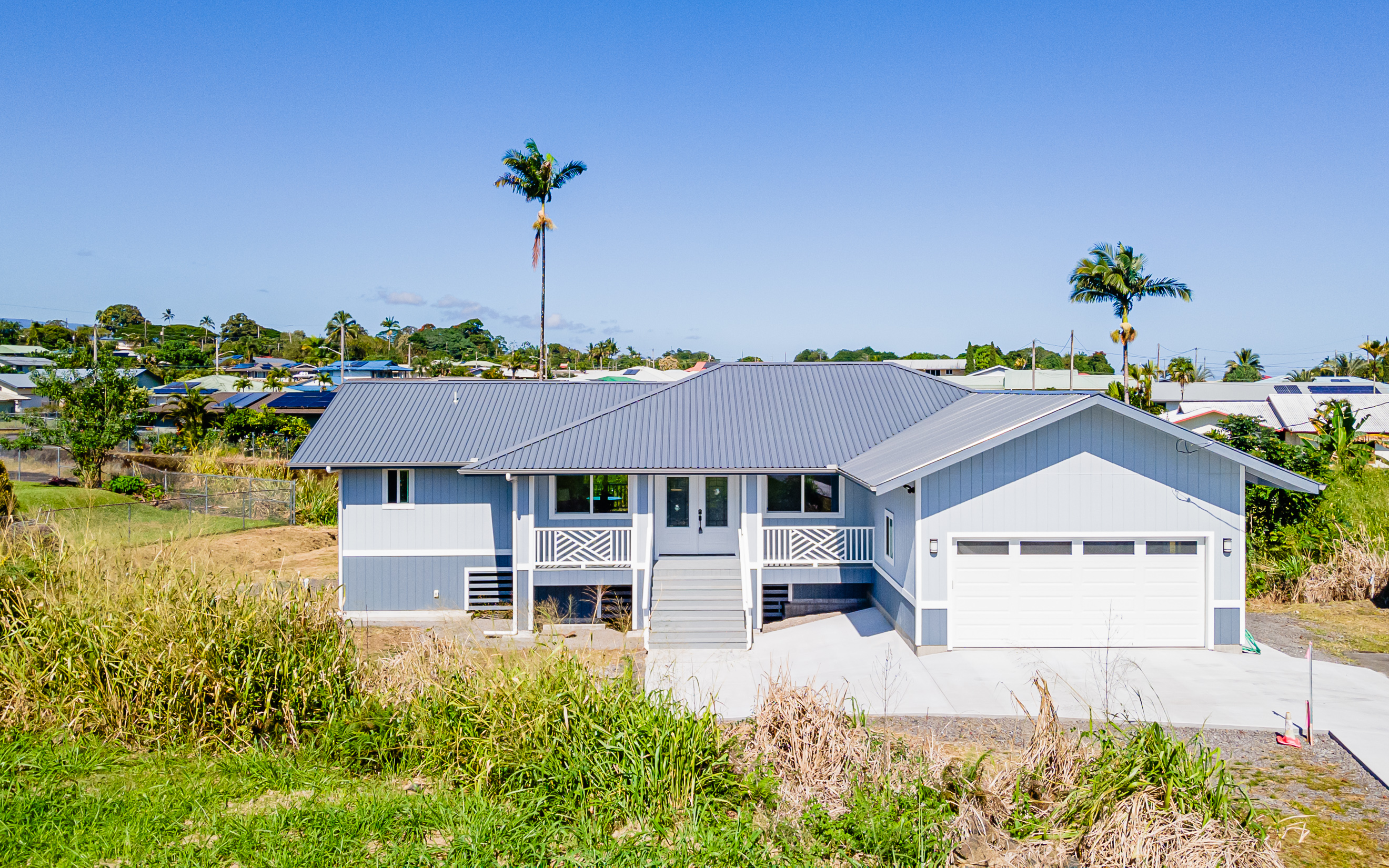 508 Ekela Street Hilo, HI 96720 - Photo 23 of 30 a view of a house with a yard and potted plants