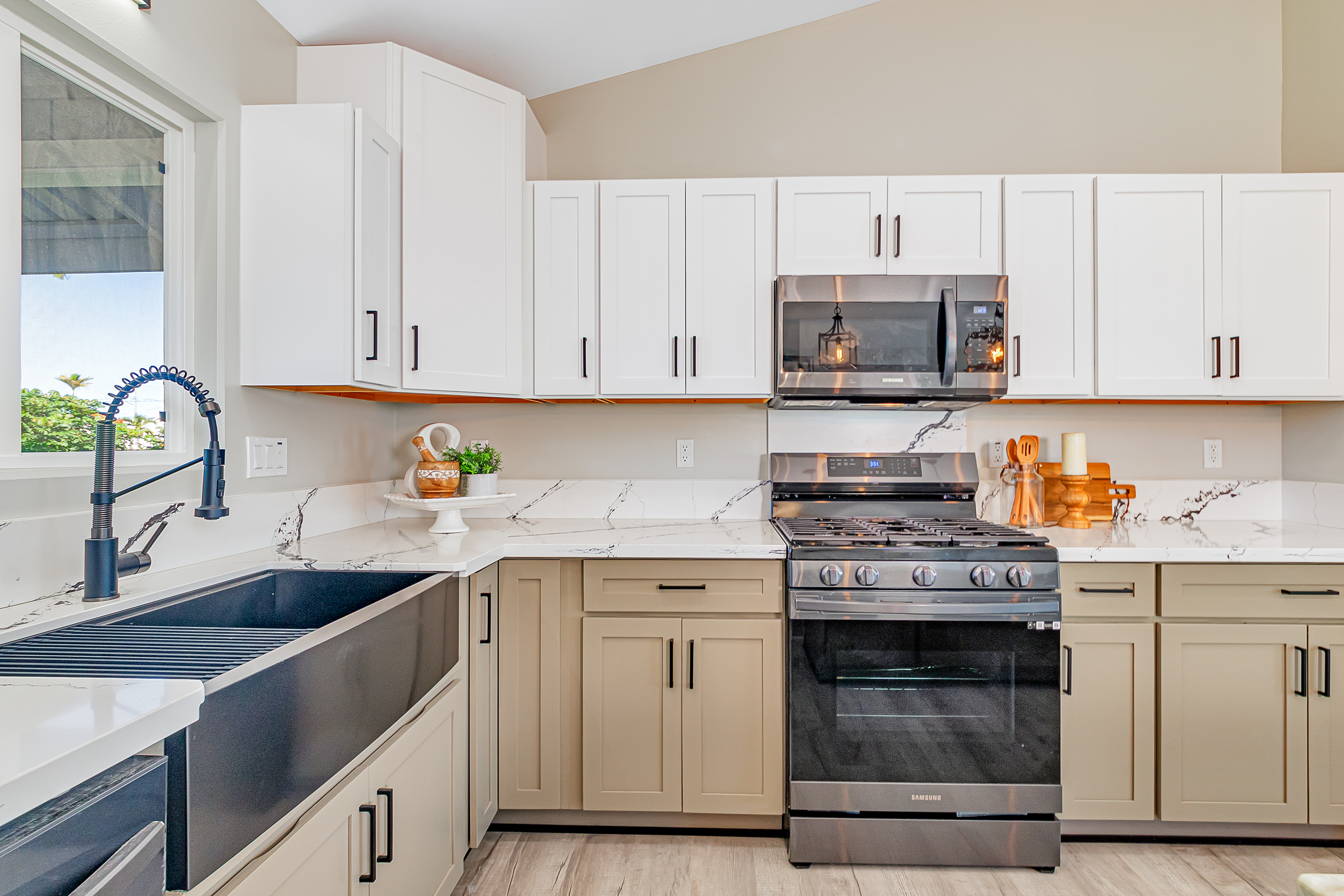 508 Ekela Street Hilo, HI 96720 - Photo 10 of 30 a kitchen with stainless steel appliances granite countertop a sink stove and cabinets