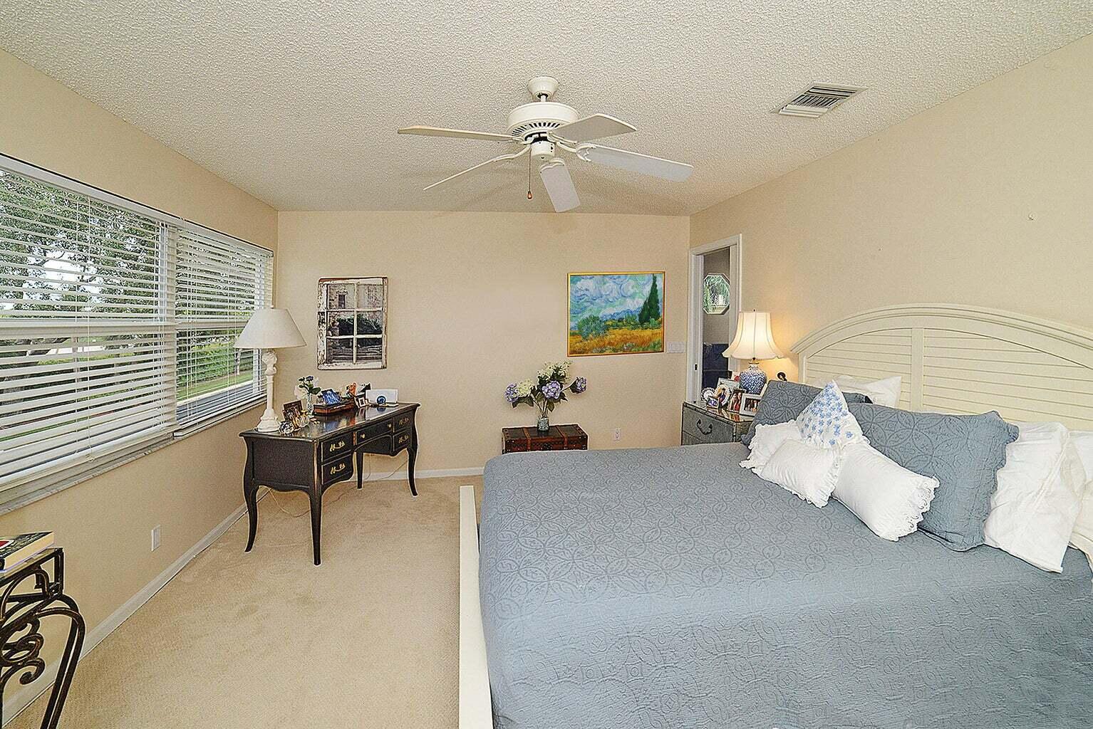 6695 Northwest 25th Court Boca Raton, FL 33496 - Photo 18 of 40 a living room with furniture and a chandelier