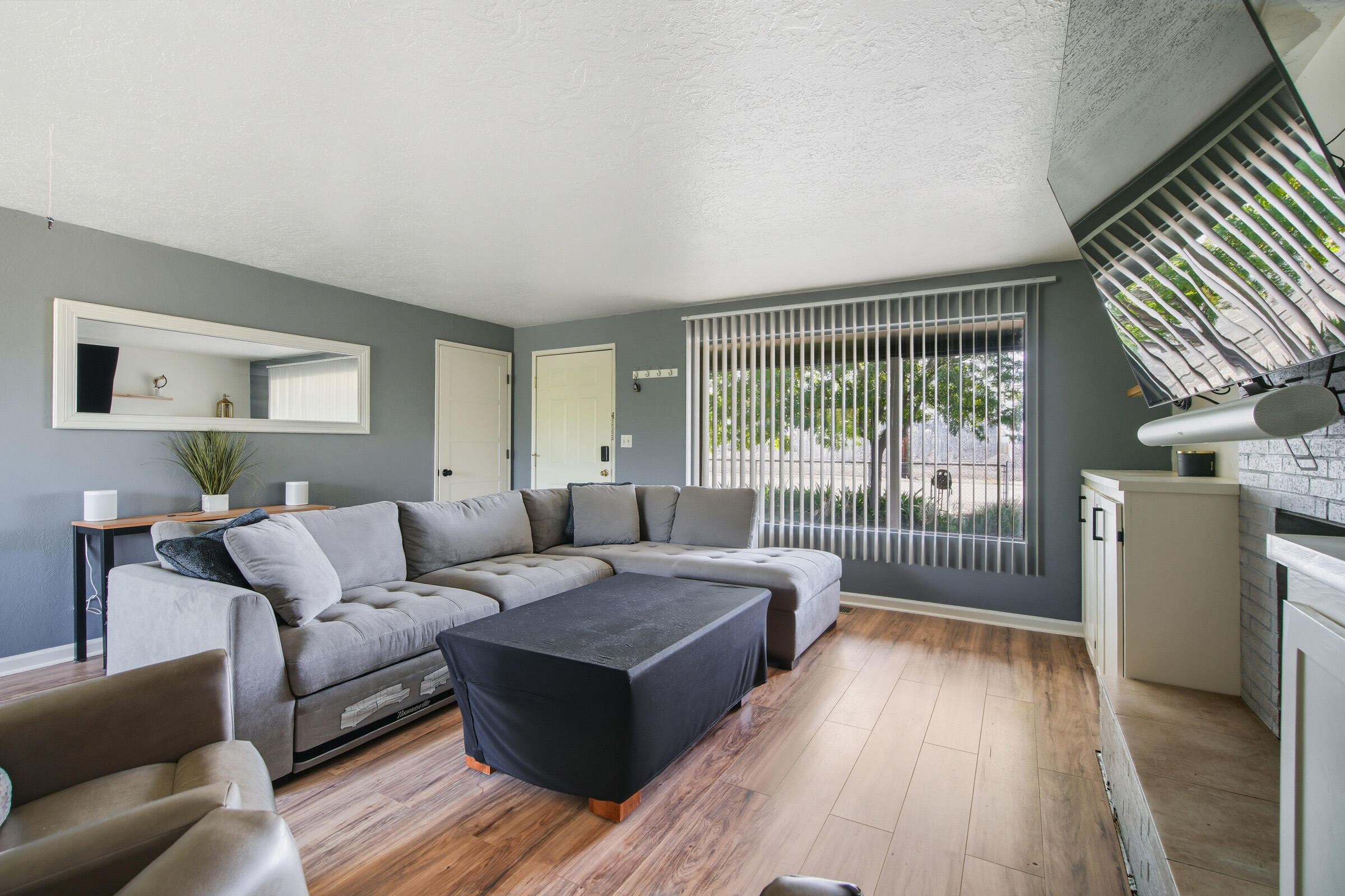 664 Southwest 35th Street Redmond, OR 97756 - Photo 3 of 19 a living room with furniture and a wooden floor
