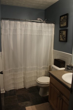 222 Reedy Creek Road Forsyth, GA 31029 - Photo 11 of 15 a bathroom with a sink a toilet and shower