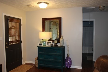 222 Reedy Creek Road Forsyth, GA 31029 - Photo 3 of 15 a bathroom with a sink mirror and vanity