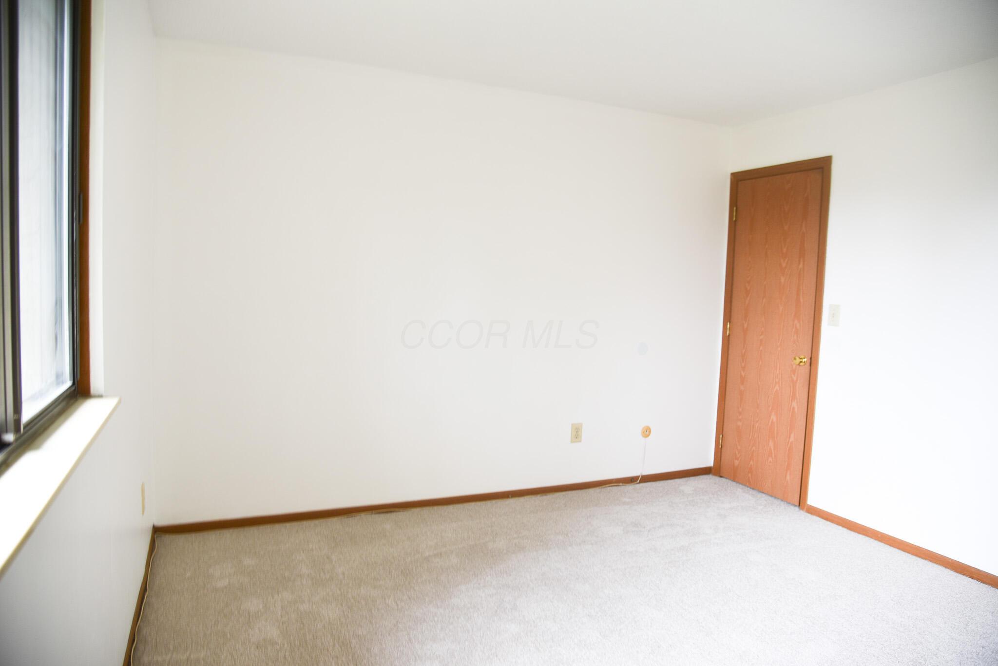 4143 Karl Road, Unit 314 Columbus, OH 43224 - Photo 18 of 28 Primary Bedroom