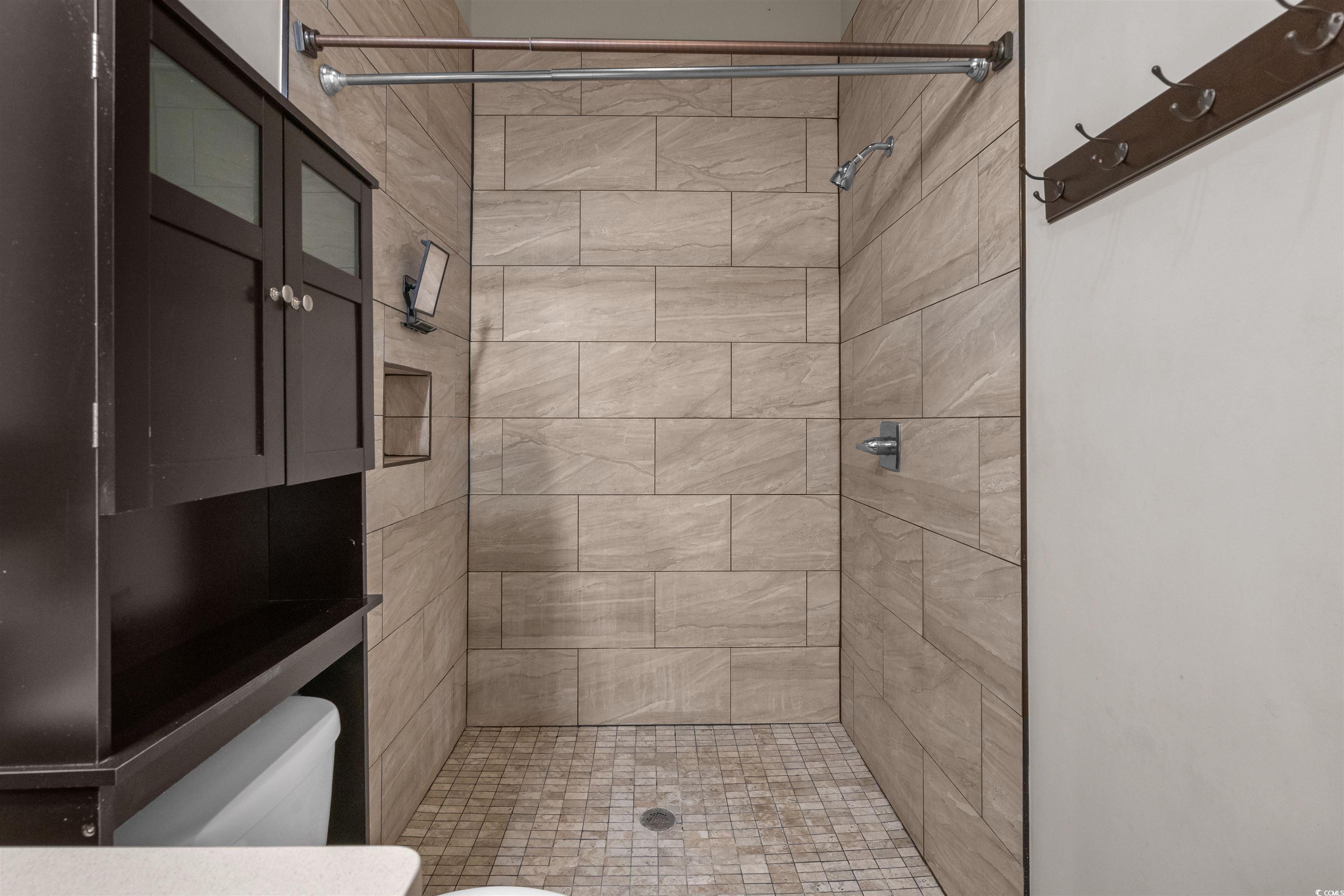 80 Shady Oak Lane Murrells Inlet, SC 29576 - Photo 16 of 31 Full bath featuring a stall shower and toilet