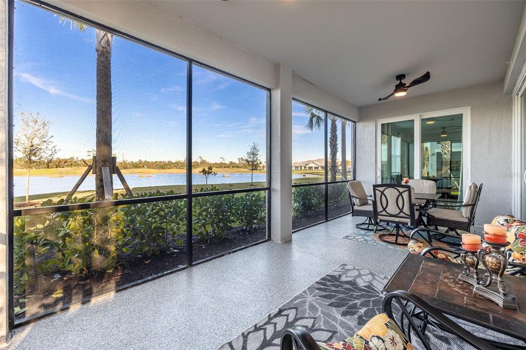 14186 Poppy Fld Loop, Unit 4911 Punta Gorda, FL 33955 - Photo 30 of 48 a living room filled with furniture