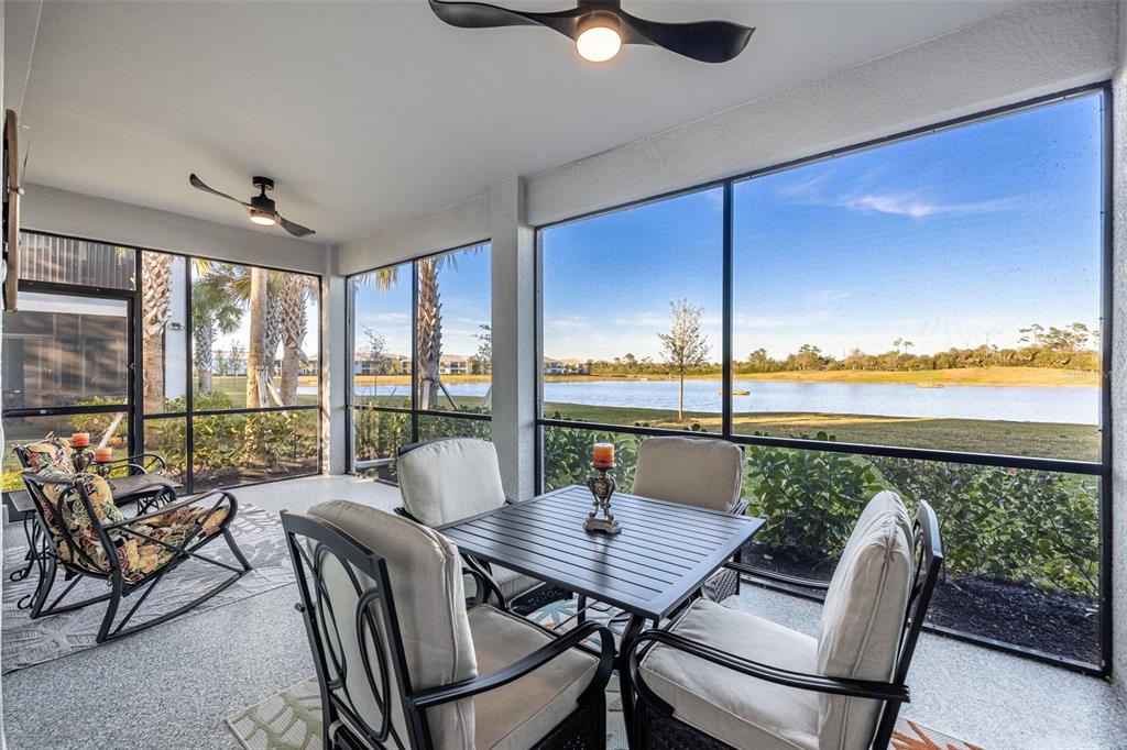 14186 Poppy Fld Loop, Unit 4911 Punta Gorda, FL 33955 - Photo 3 of 48 a view of a city from a dining room with furniture window and outside view