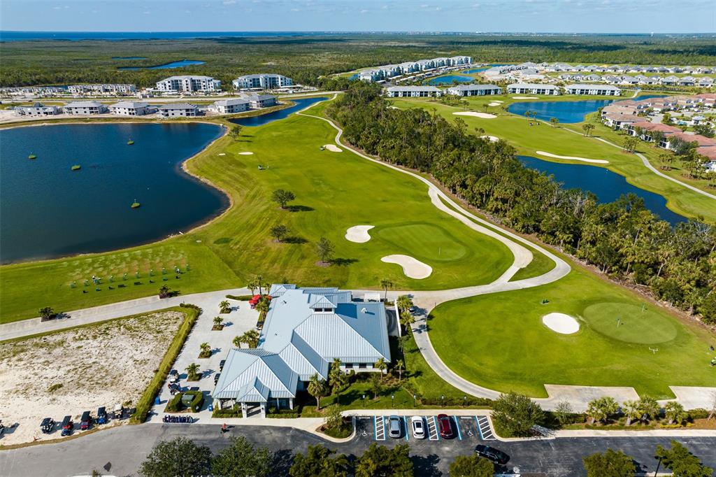 14186 Poppy Fld Loop, Unit 4911 Punta Gorda, FL 33955 - Photo 6 of 48 an aerial view of a pool patio swimming pool and outdoor seating