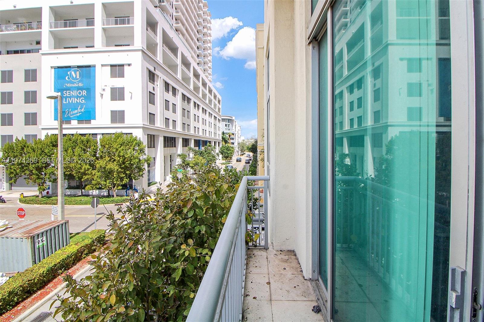 9066 Southwest 73rd Court, Unit 203 Miami, FL 33156 - Photo 14 of 28 a view of a balcony with an outdoor space
