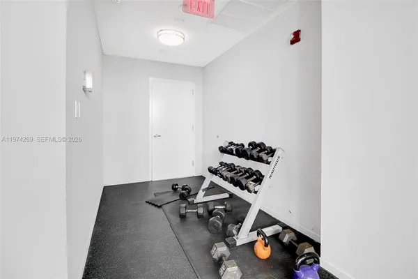 a view of a room with gym equipment