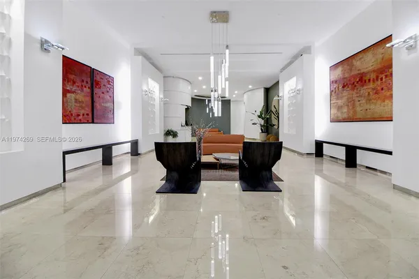 a living room with furniture and a couch