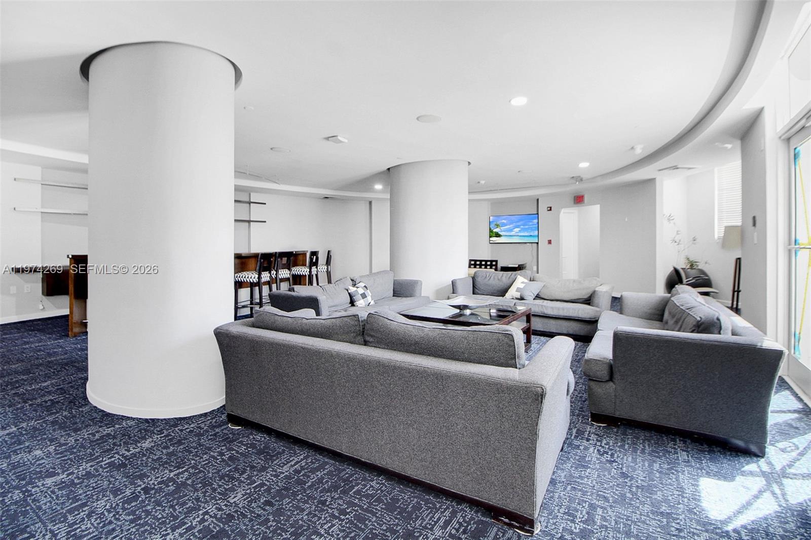 9066 Southwest 73rd Court, Unit 203 Miami, FL 33156 - Photo 20 of 28 a living room with furniture and a couch