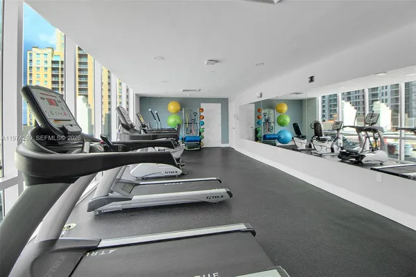 a view of a room with gym equipment