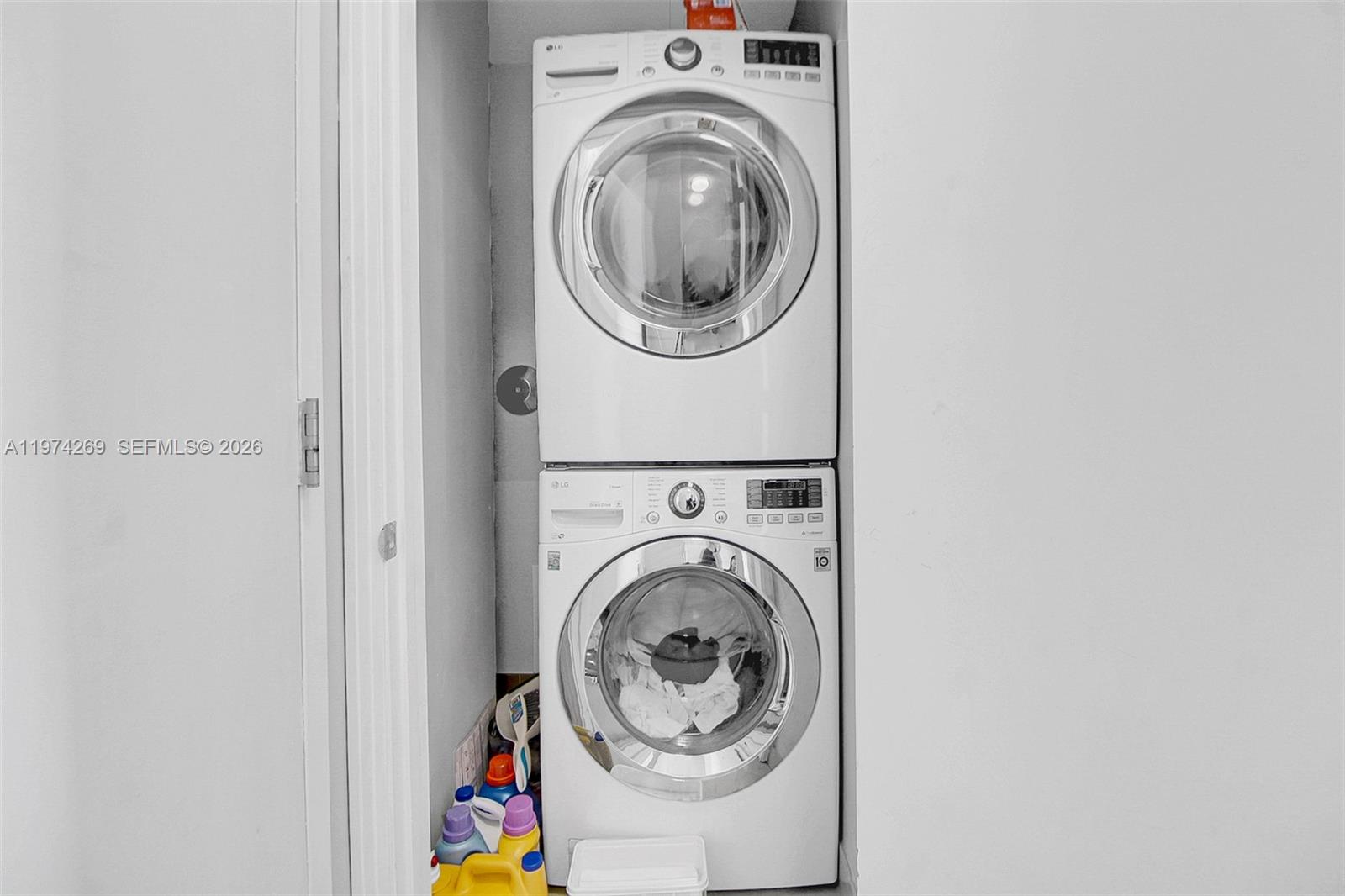 9066 Southwest 73rd Court, Unit 203 Miami, FL 33156 - Photo 27 of 28 a utility room with dryer and washer