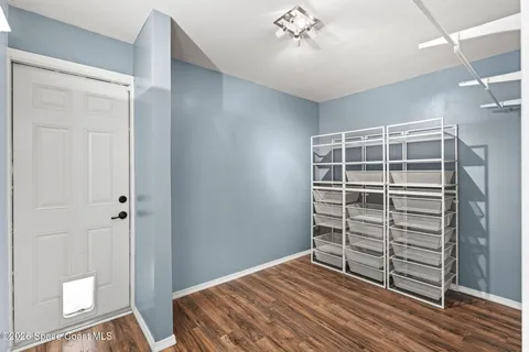 a view of an entryway with front door