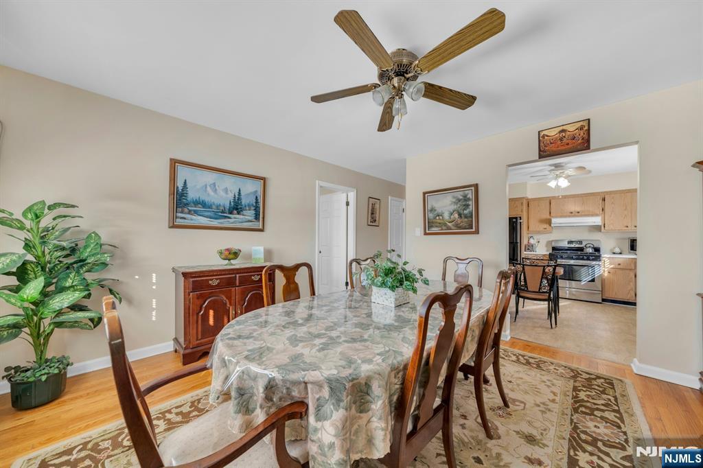 648 Milton Avenue Lyndhurst, NJ 07071 - Photo 11 of 29 a view of a livingroom with furniture and a potted plant