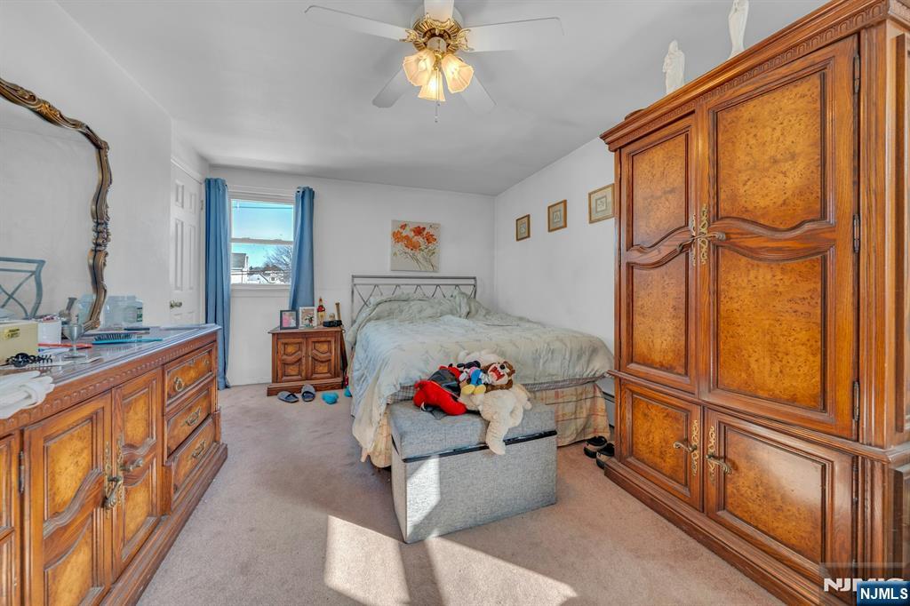 648 Milton Avenue Lyndhurst, NJ 07071 - Photo 15 of 29 a living room with furniture and a window