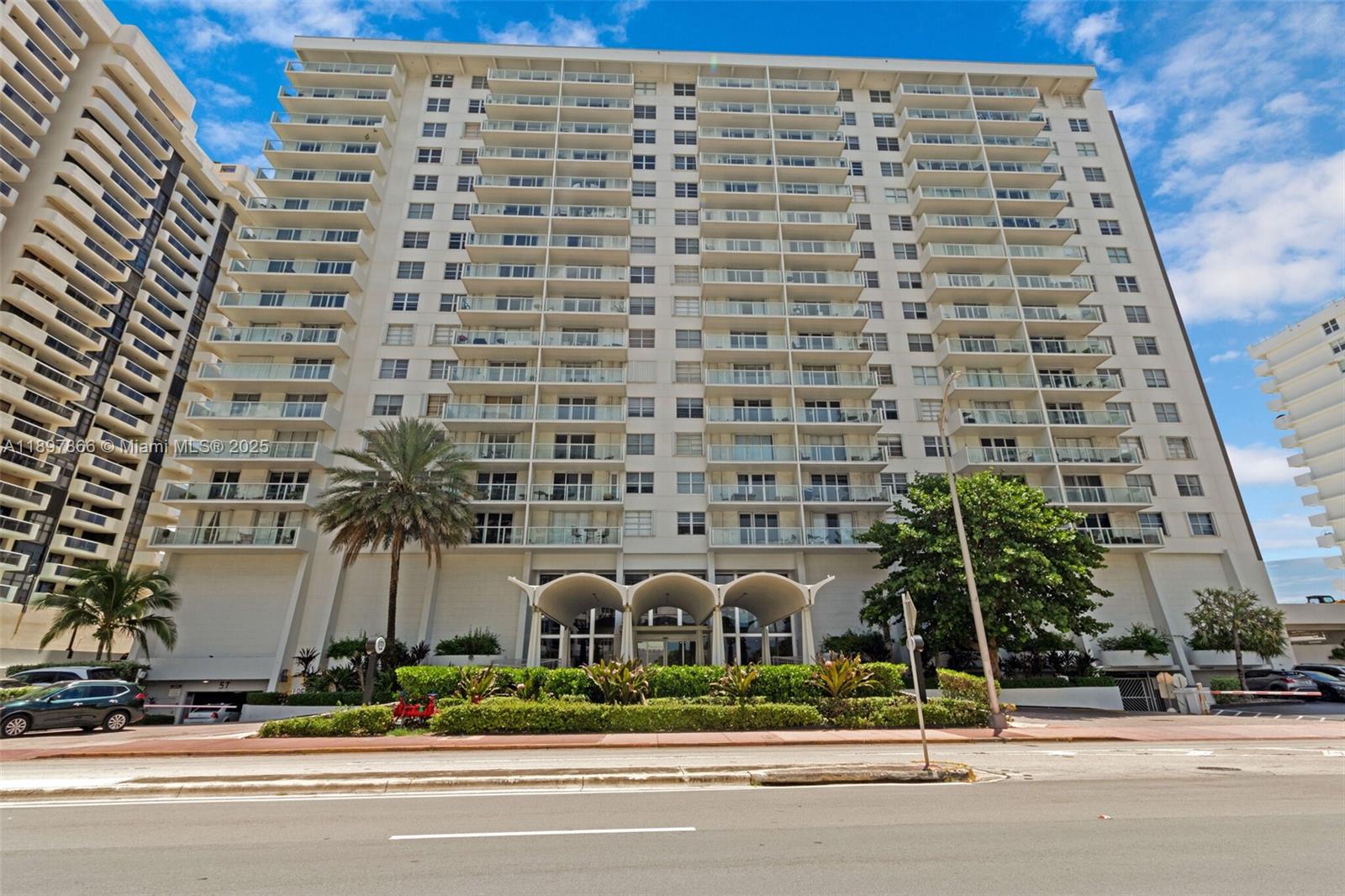 5701 Collins Avenue, Unit 1207 Miami Beach, FL 33140 - Photo 1 of 44 a front view of a building