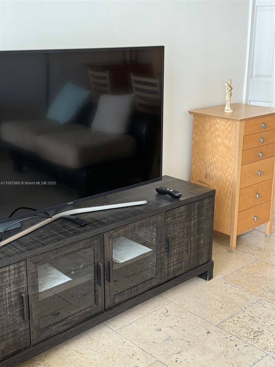 5701 Collins Avenue, Unit 1207 Miami Beach, FL 33140 - Photo 15 of 44 a stove top oven sitting inside of a kitchen