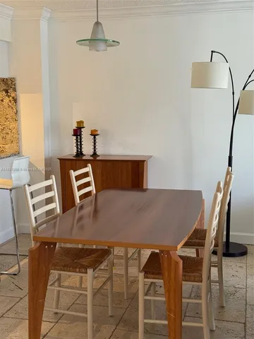 a view of a lake in middle of sunset