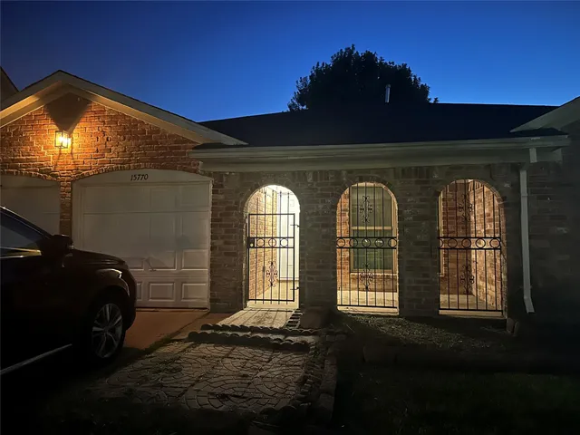 a front view of a house with street