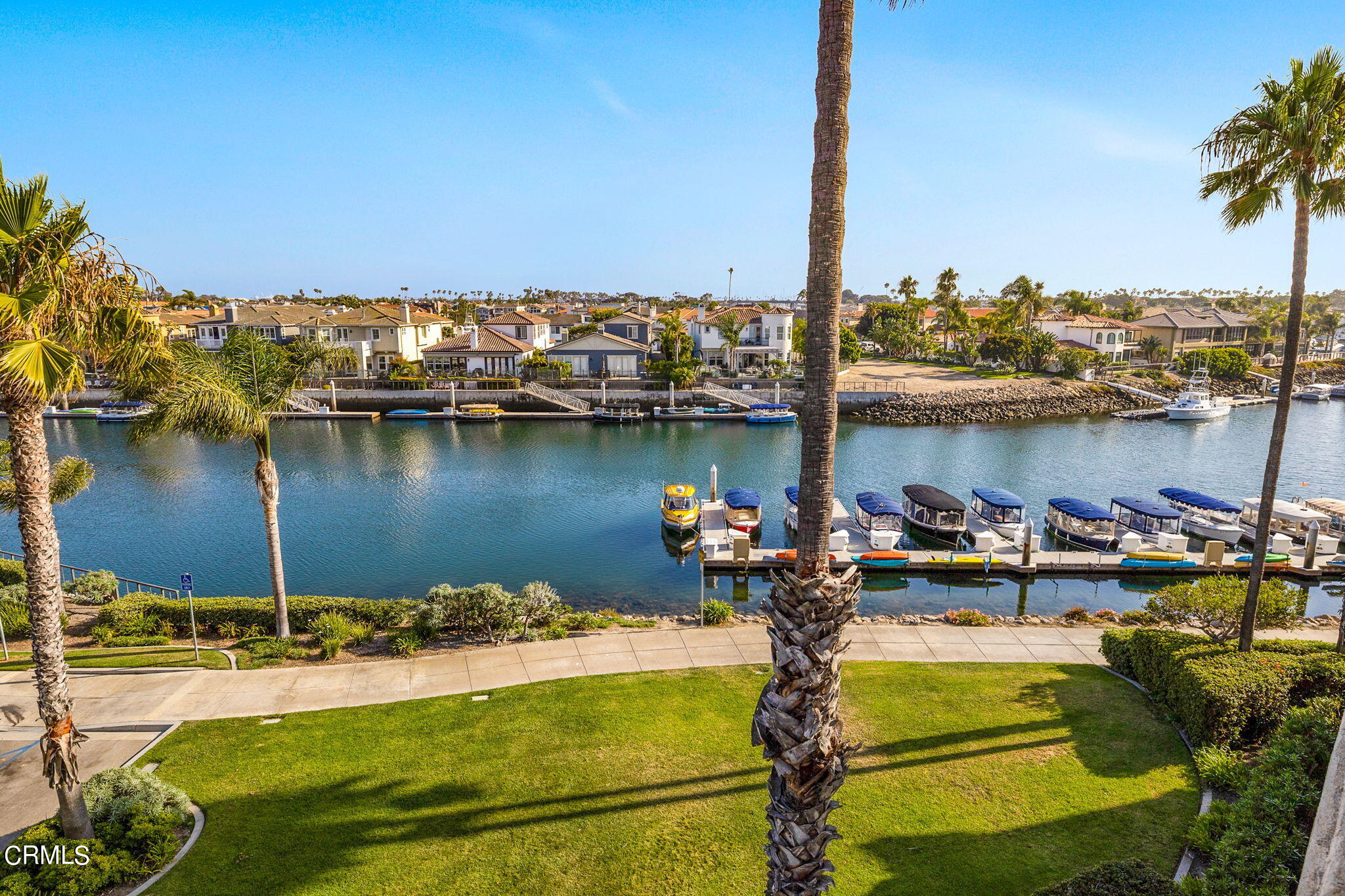 4212 Harbour Island Lane Oxnard, CA 93035 - Photo 19 of 48 a view of a lake with boats and trees