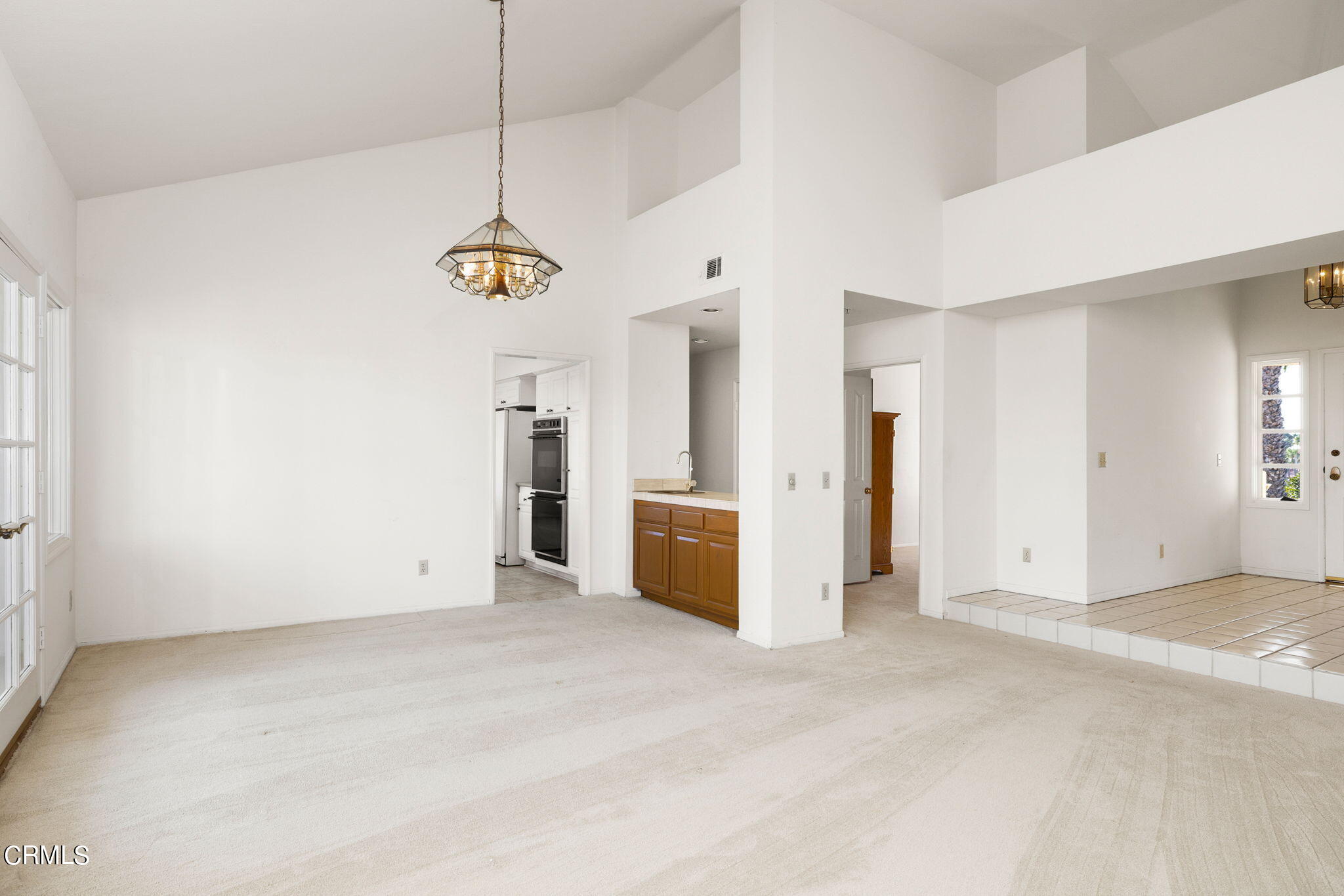 4212 Harbour Island Lane Oxnard, CA 93035 - Photo 20 of 48 a view of a kitchen with a refrigerator ceiling fan