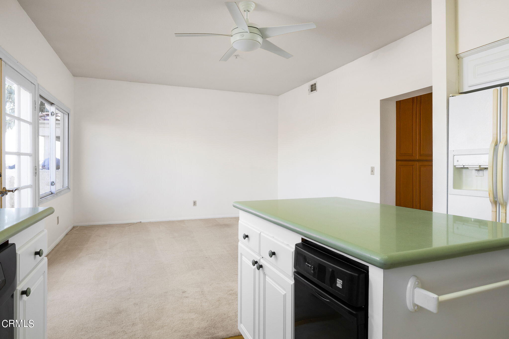4212 Harbour Island Lane Oxnard, CA 93035 - Photo 26 of 48 a kitchen with a sink and cabinets