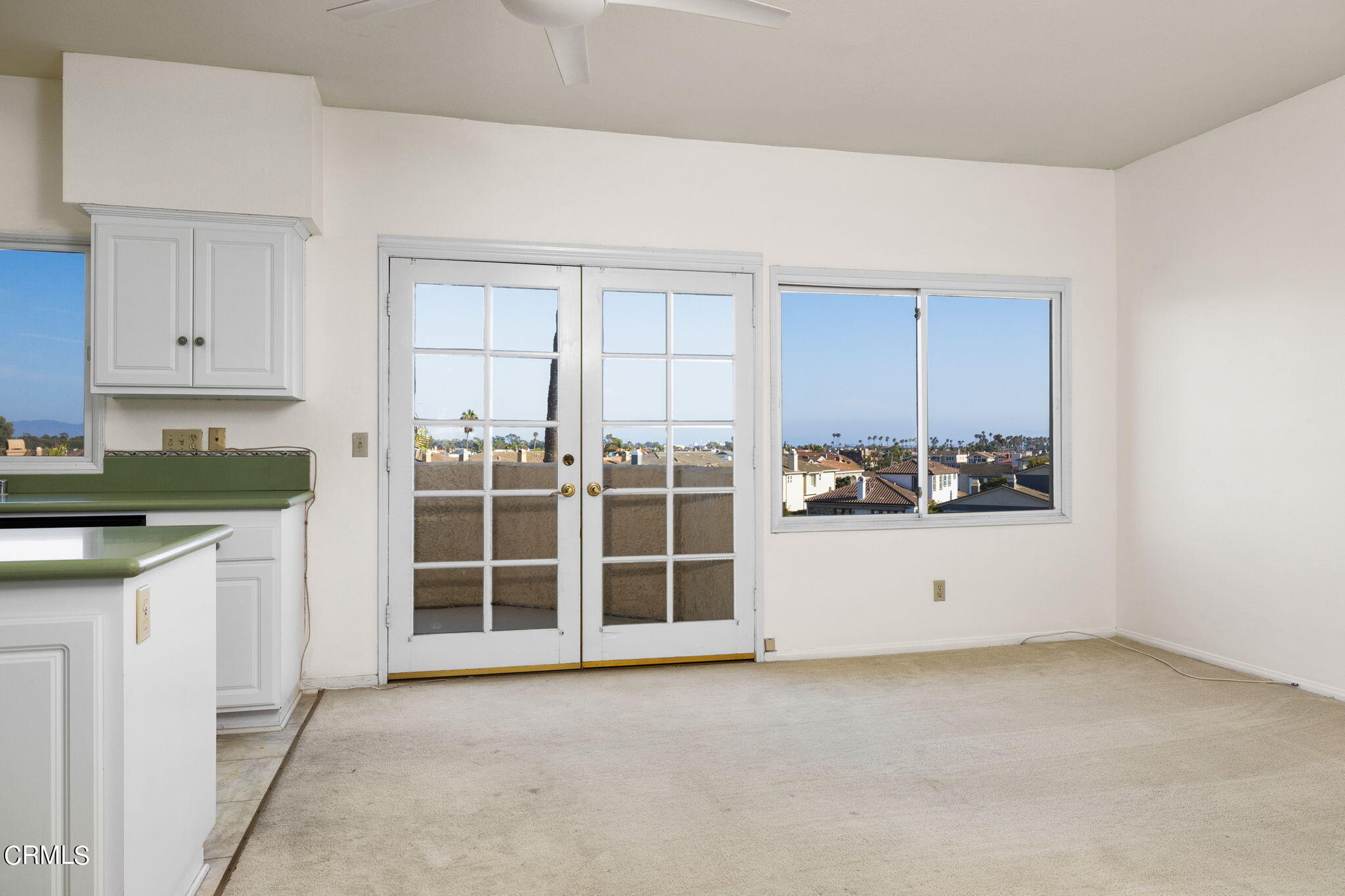 4212 Harbour Island Lane Oxnard, CA 93035 - Photo 27 of 48 an empty room with a kitchen and window