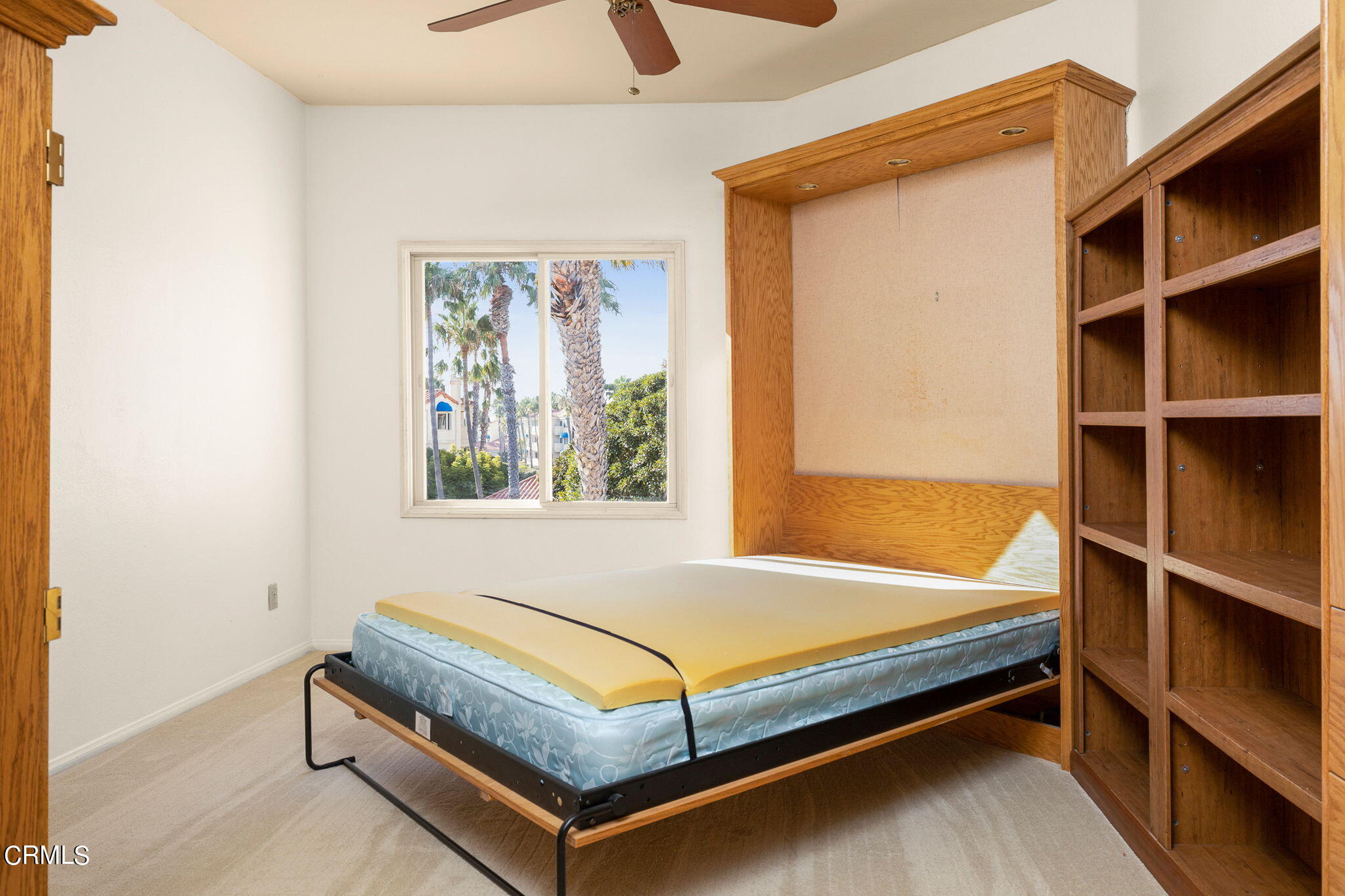 4212 Harbour Island Lane Oxnard, CA 93035 - Photo 33 of 48 a bedroom with a bed and window