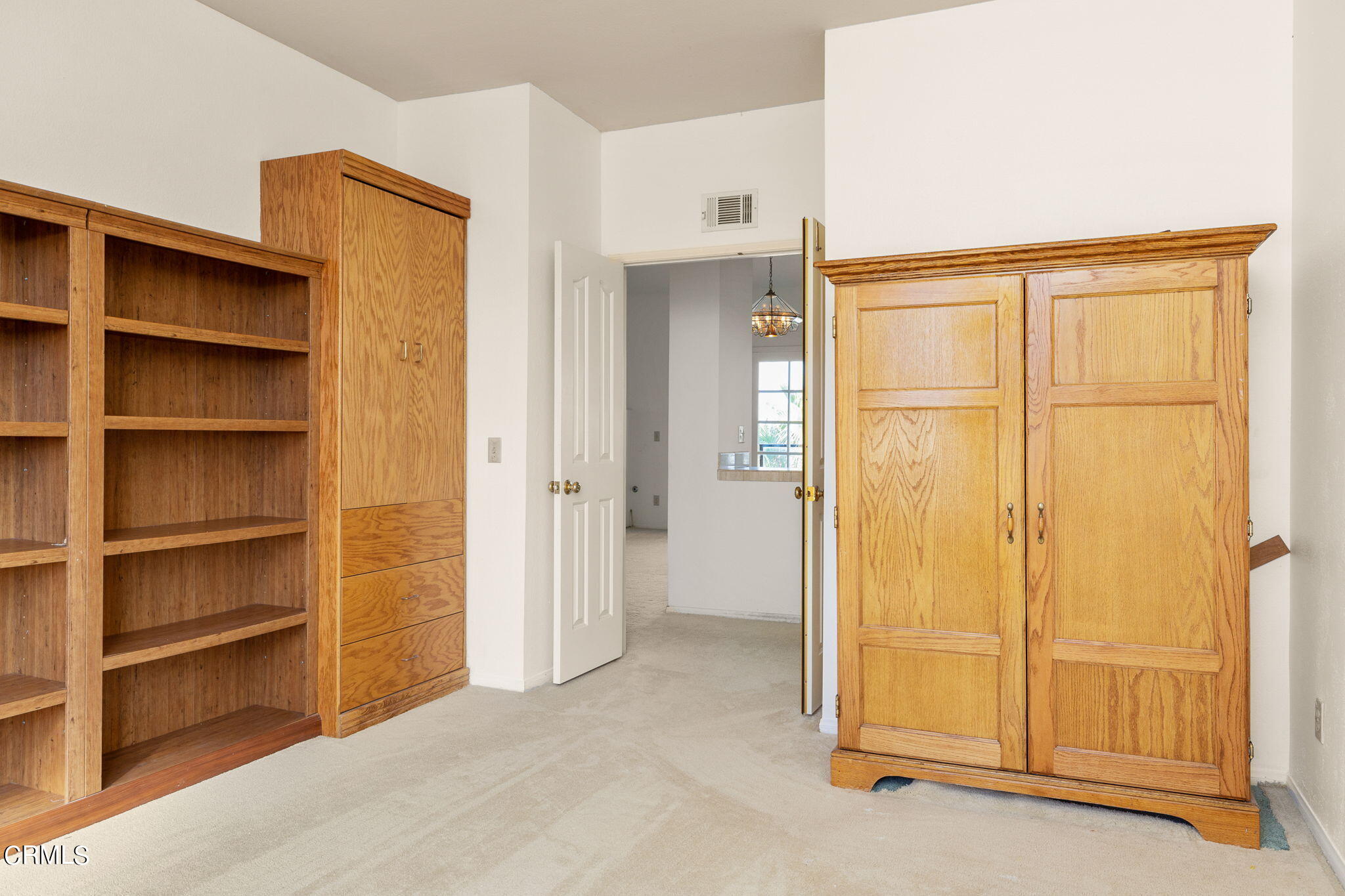 4212 Harbour Island Lane Oxnard, CA 93035 - Photo 34 of 48 a view of an empty room with cabinet and utility room