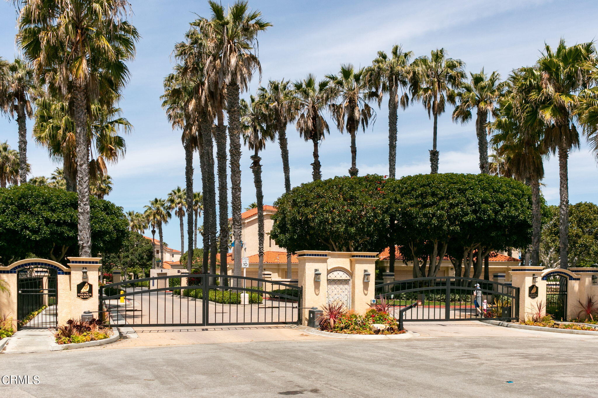 4212 Harbour Island Lane Oxnard, CA 93035 - Photo 44 of 48 a view of multiple houses with palm trees