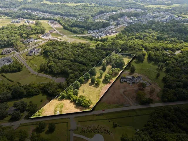 a view of a lake from a balcony