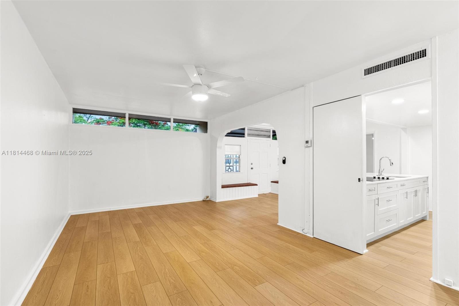 15007 Coconut Court Miami Lakes, FL 33014 - Photo 11 of 27 a view of a room with wooden floor