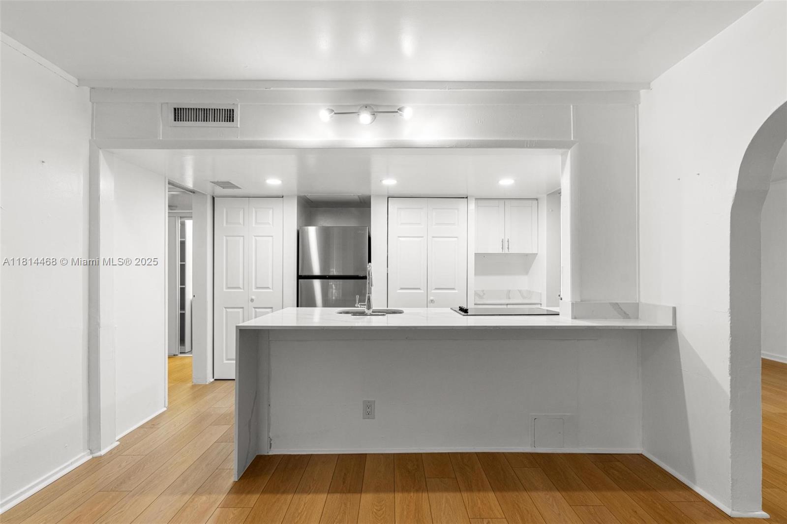 15007 Coconut Court Miami Lakes, FL 33014 - Photo 12 of 27 a view of kitchen with stainless steel appliances cabinets and outdoor space