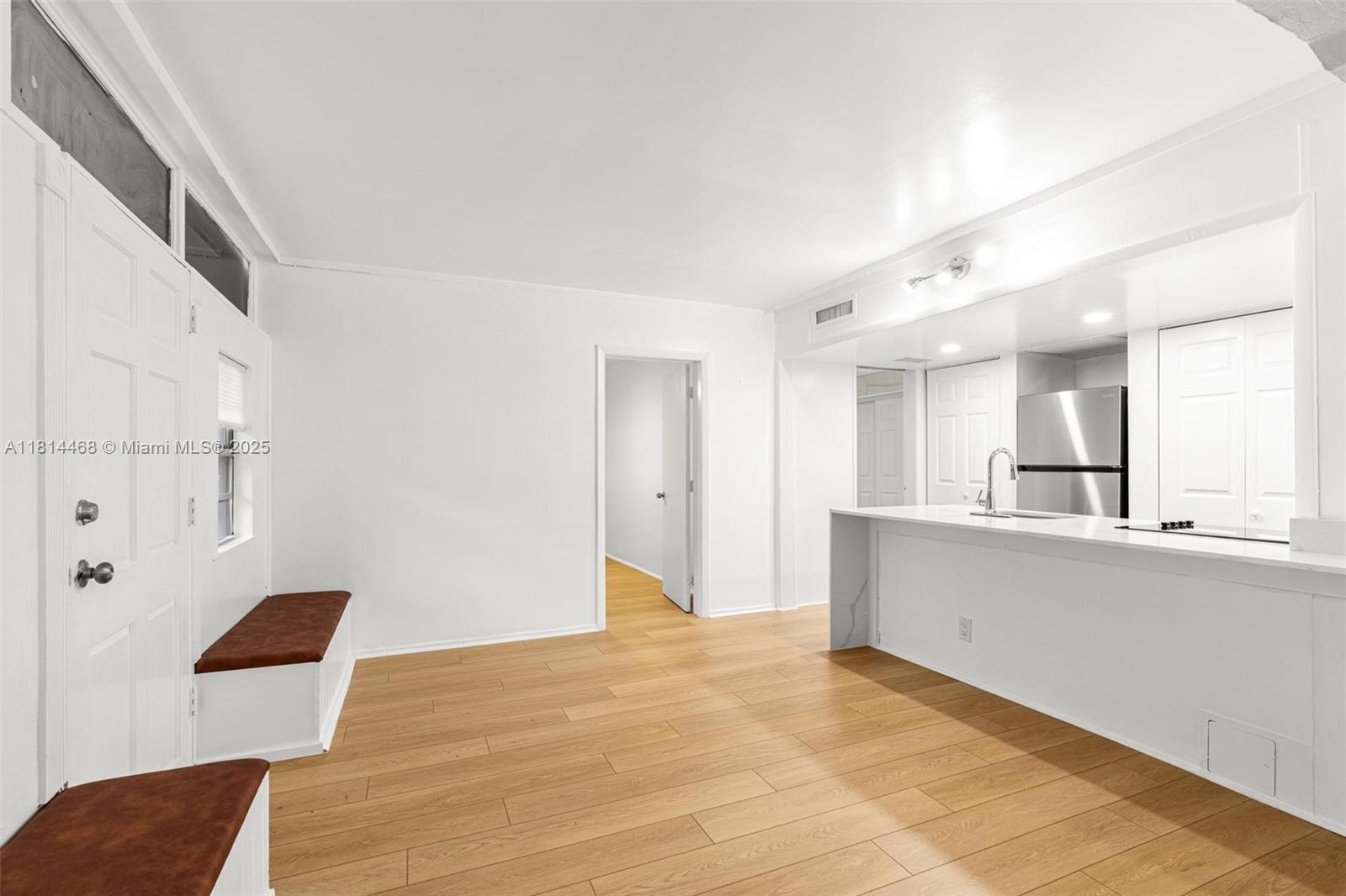 15007 Coconut Court Miami Lakes, FL 33014 - Photo 7 of 27 a view of kitchen with furniture and refrigerator