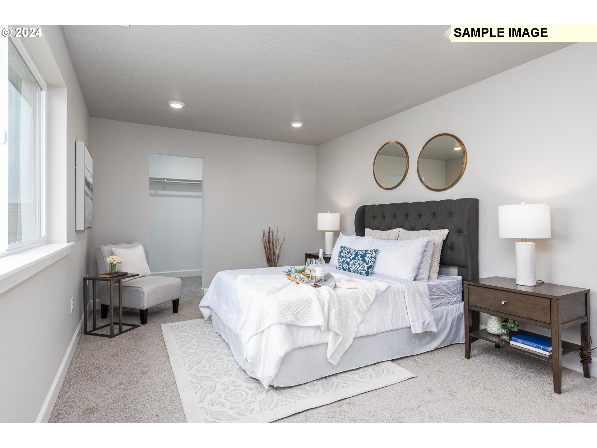 1734 Northeast 9th Street Hermiston, OR 97838 - Photo 16 of 31 a bedroom with a bed and window