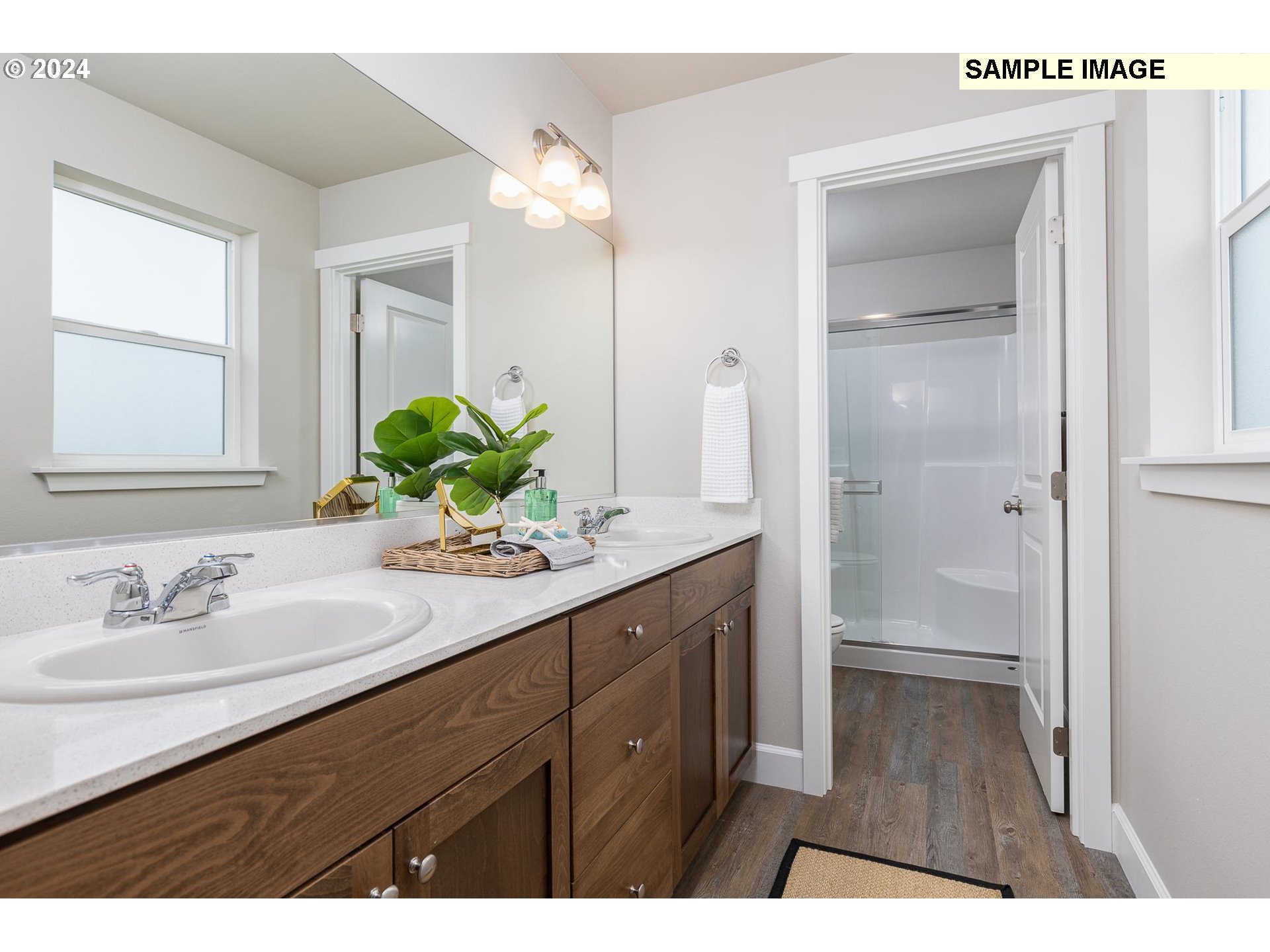 1734 Northeast 9th Street Hermiston, OR 97838 - Photo 19 of 31 a bathroom with a sink and a mirror
