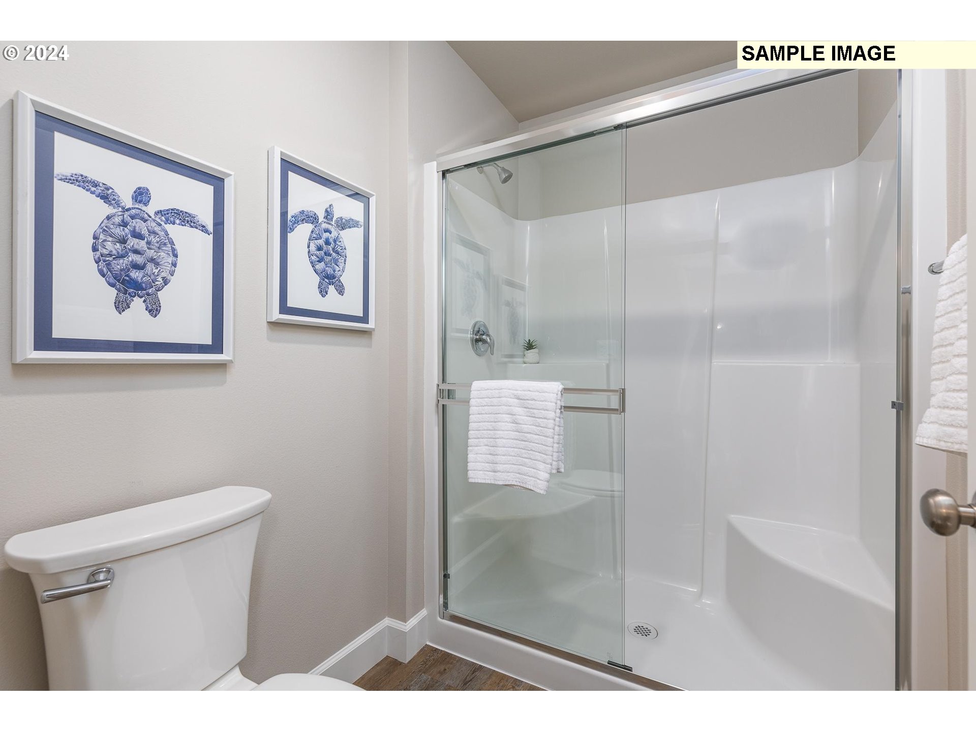 1734 Northeast 9th Street Hermiston, OR 97838 - Photo 20 of 31 a bathroom with a shower and a toilet