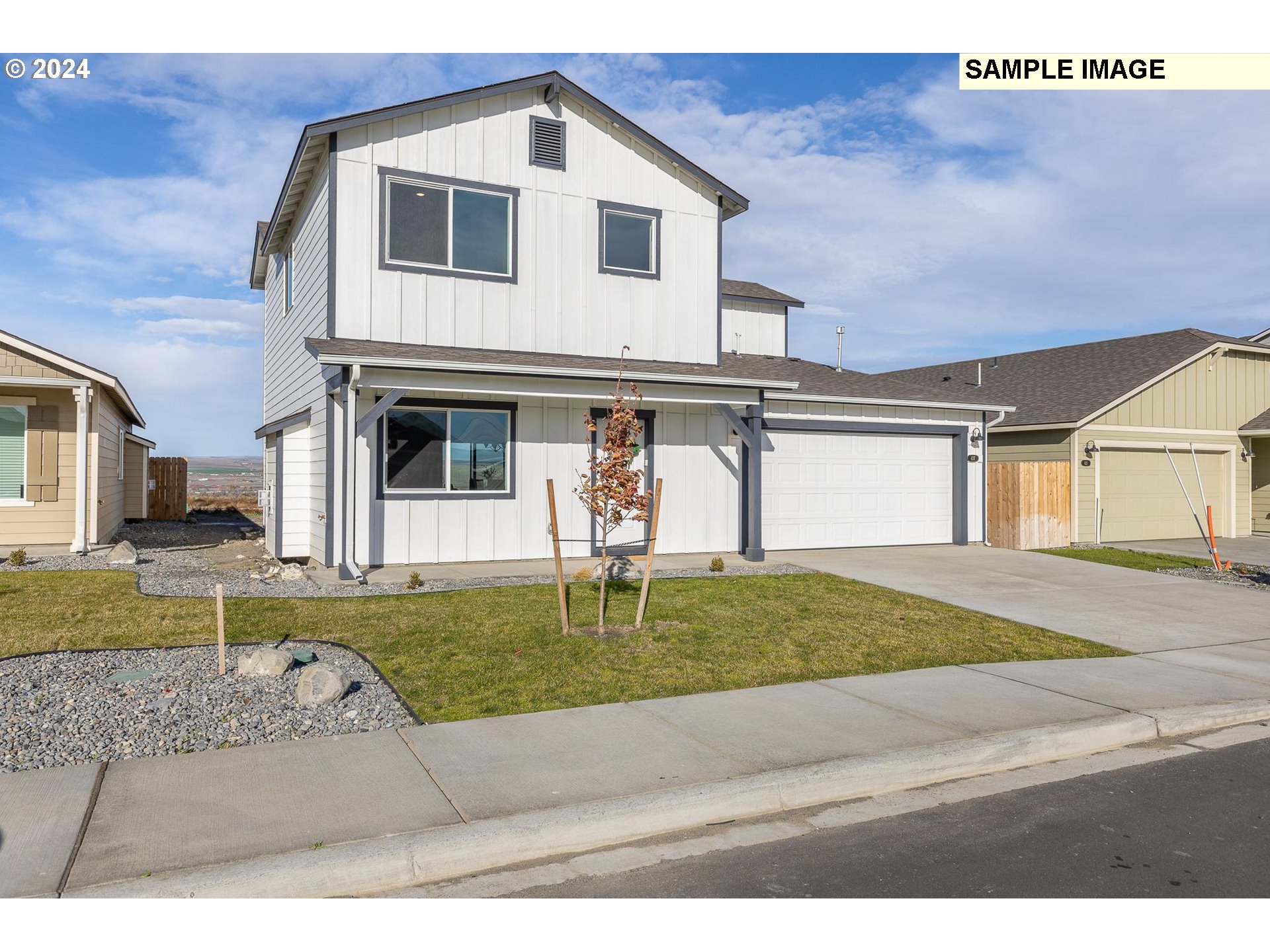 1734 Northeast 9th Street Hermiston, OR 97838 - Photo 3 of 31 a house view with a outdoor space