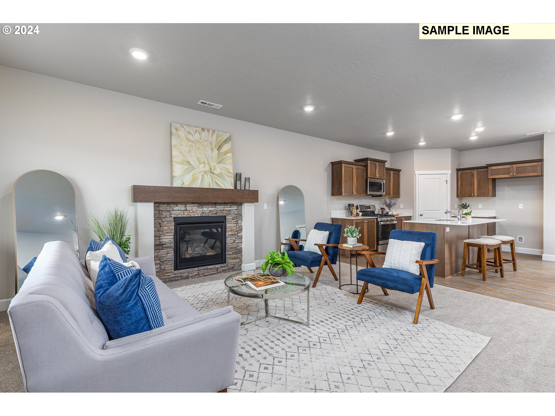 1734 Northeast 9th Street Hermiston, OR 97838 - Photo 7 of 31 a living room with furniture and a fireplace