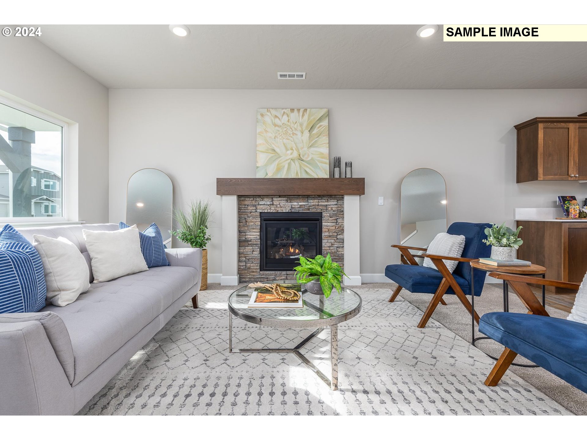 1734 Northeast 9th Street Hermiston, OR 97838 - Photo 8 of 31 a living room with furniture and a fireplace