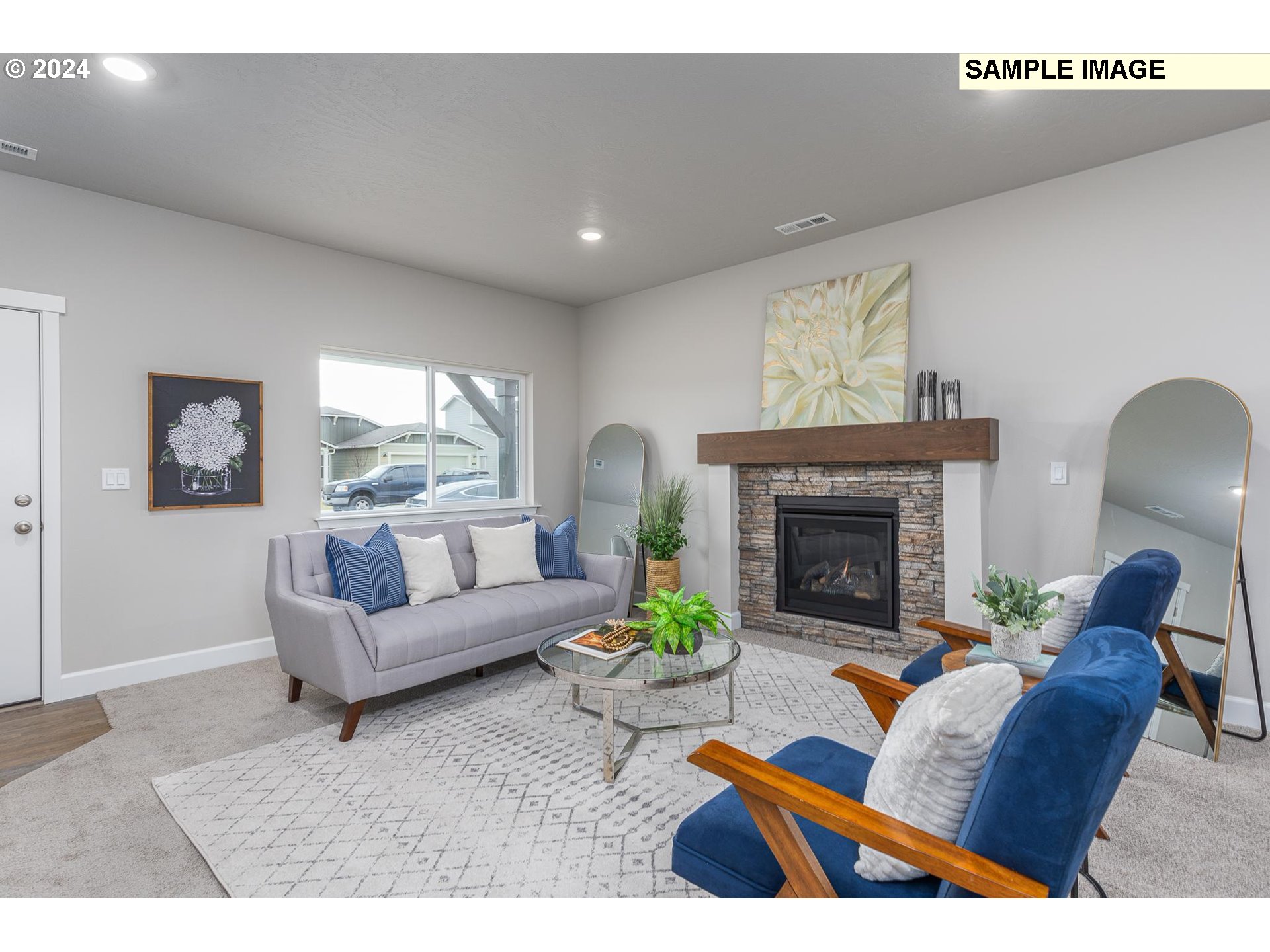 1734 Northeast 9th Street Hermiston, OR 97838 - Photo 9 of 31 a living room with furniture and a fireplace