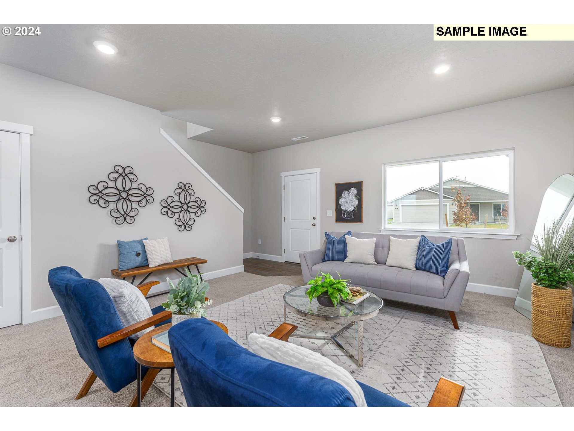 1734 Northeast 9th Street Hermiston, OR 97838 - Photo 10 of 31 a living room with furniture and wooden floor