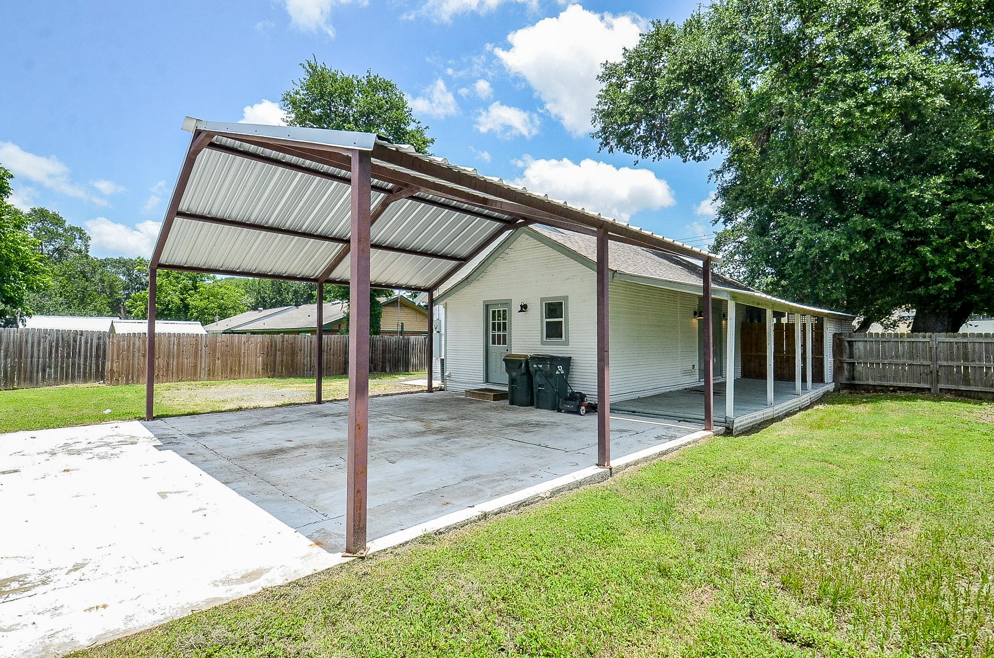1615 Eagle Lake Road Sealy, TX 77474 - Photo 18 of 19 This home features a back entrance and a double covered parking area!